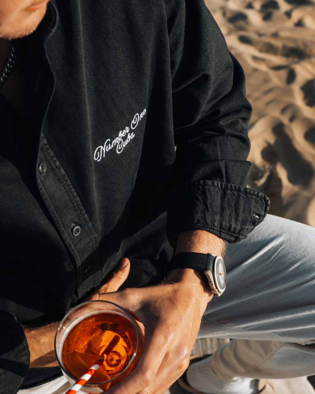 Detail shot of washed black cotton 360 gsm fabric – No.1 Cubs shirt