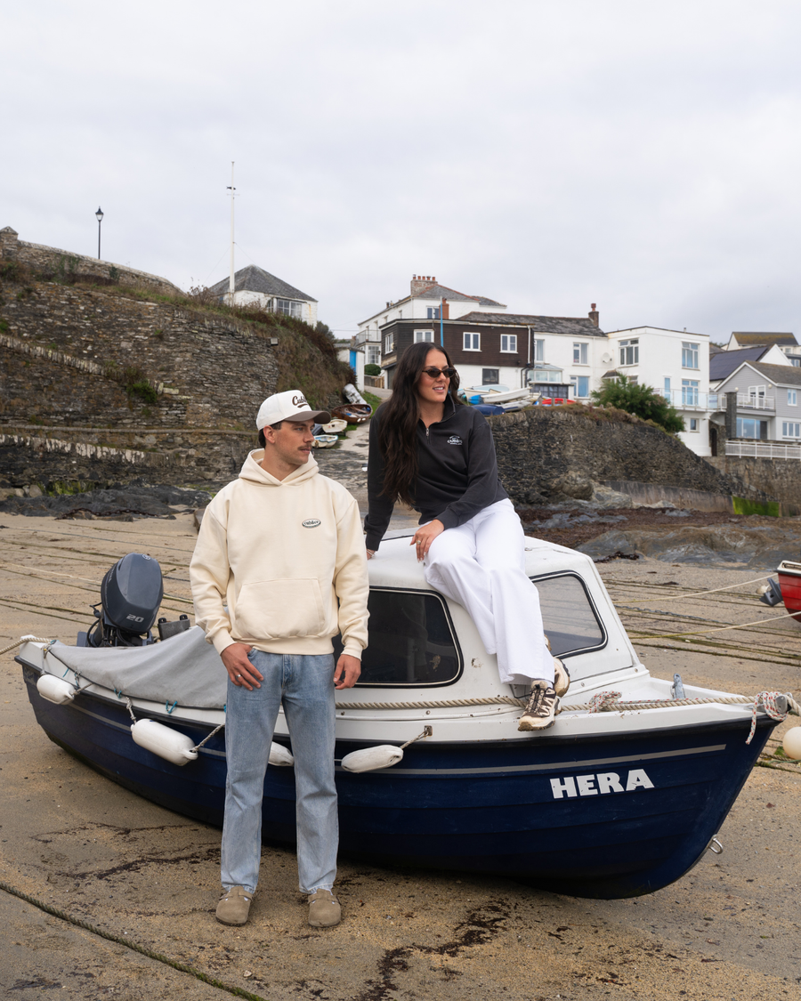 Two friends in Cub&Co on a fishing boat in Mevagissey harbour